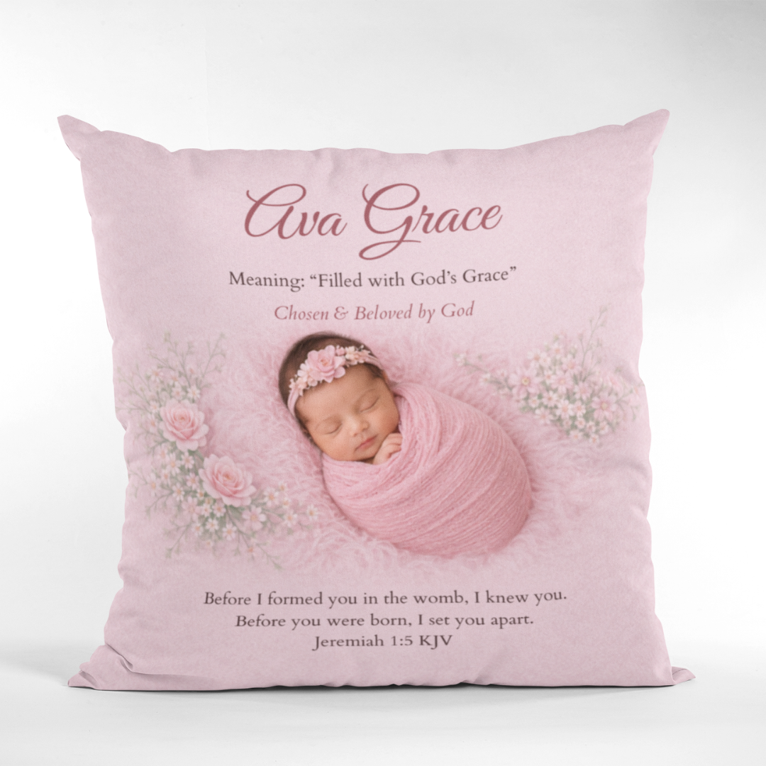 Pink pillow with a baby photo and text on a white background