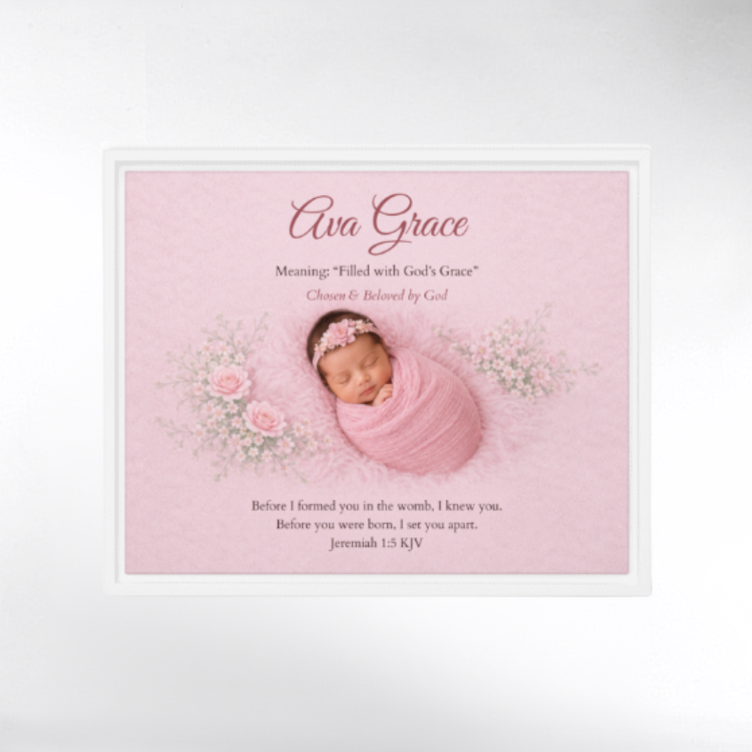 Baby girl wrapped in pink with floral decorations on a light pink background