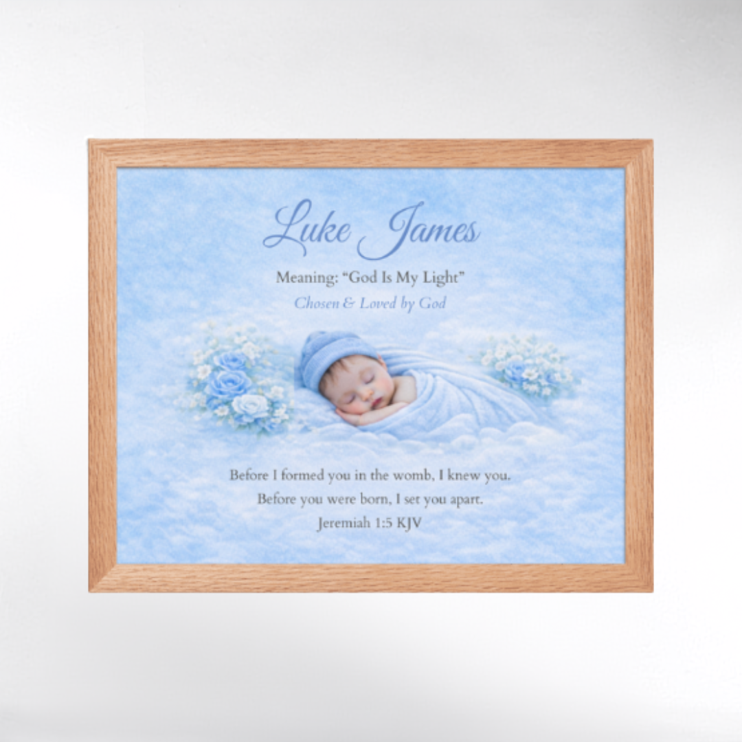 Framed print with a baby in blue wrap and text on a light blue background