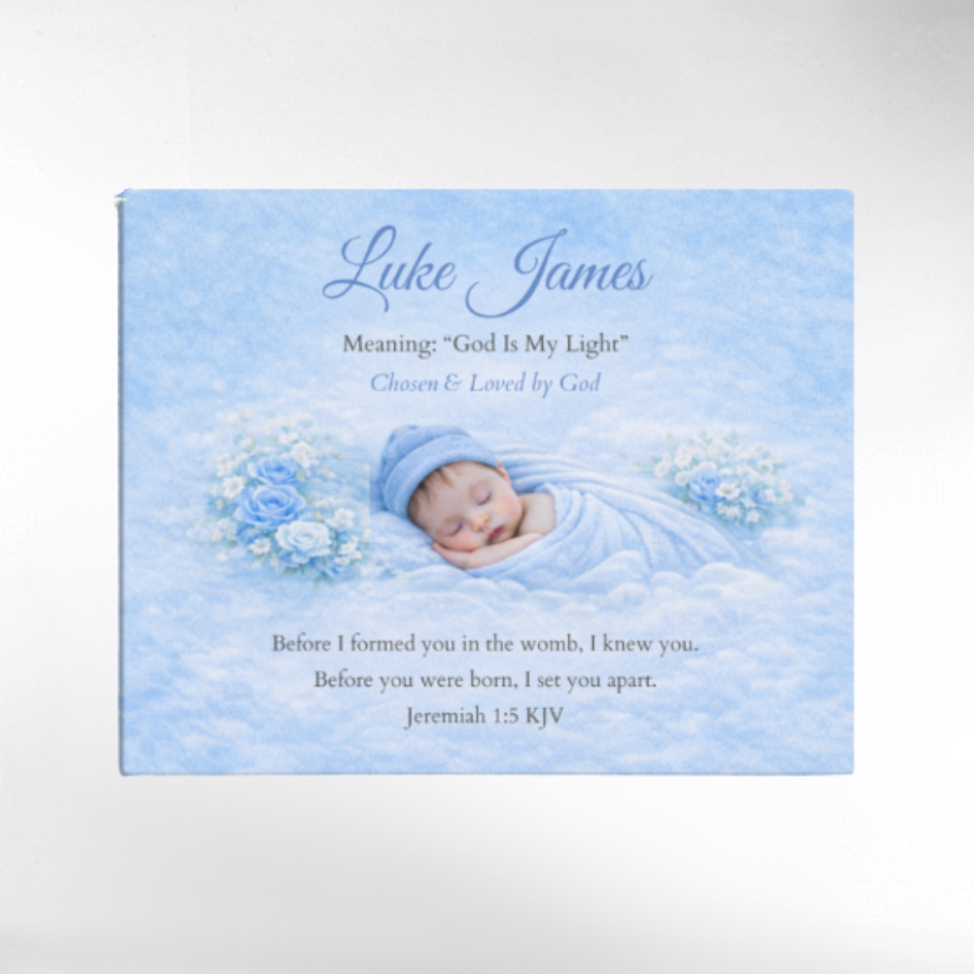 Baby boy in blue wrap with floral arrangement on a light blue background, featuring the name Luke James and religious text.