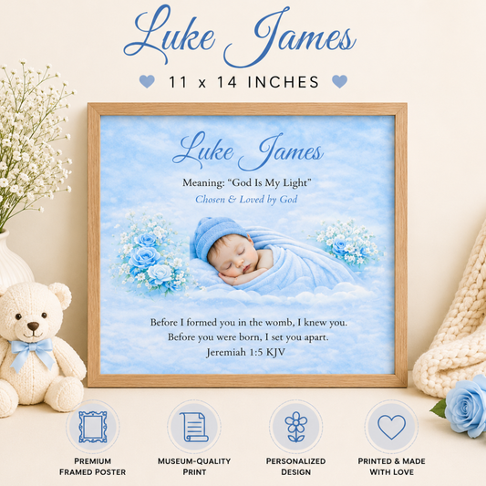 Framed poster with a baby in blue and text, featuring a teddy bear and flowers on a light background.